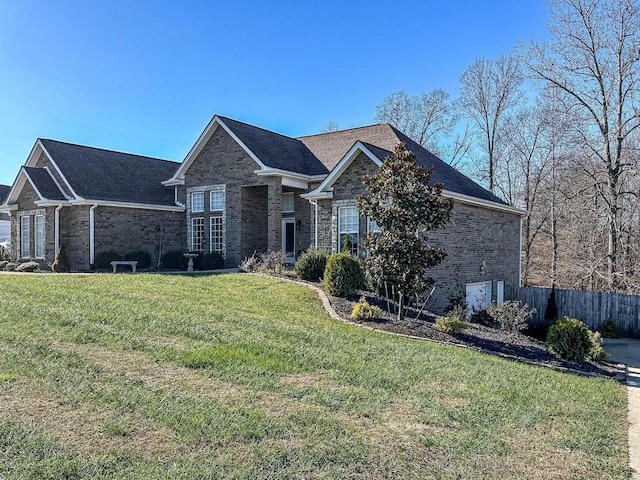 view of front of house with a garage and a front yard