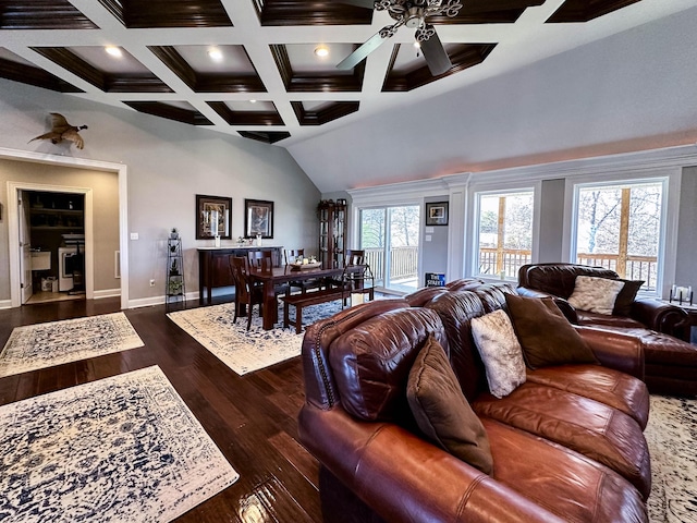 living room featuring beamed ceiling, dark hardwood / wood-style floors, ceiling fan, and coffered ceiling