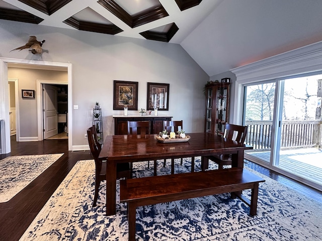 dining room with beam ceiling, crown molding, coffered ceiling, and dark hardwood / wood-style floors