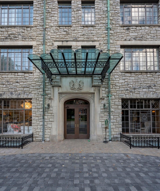 entrance to property featuring french doors