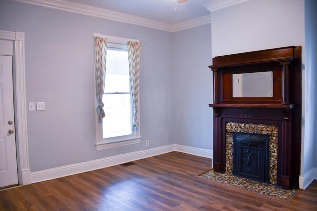 unfurnished living room with dark hardwood / wood-style floors, ceiling fan, crown molding, and a tile fireplace