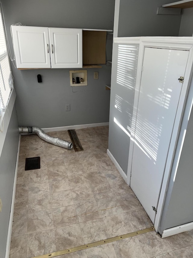 laundry area with cabinets, washer hookup, and hookup for an electric dryer