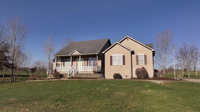 view of front of home with covered porch and a front yard