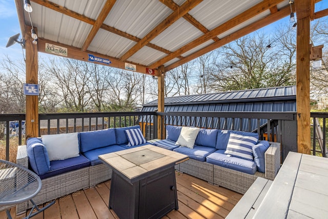 wooden terrace featuring an outdoor hangout area