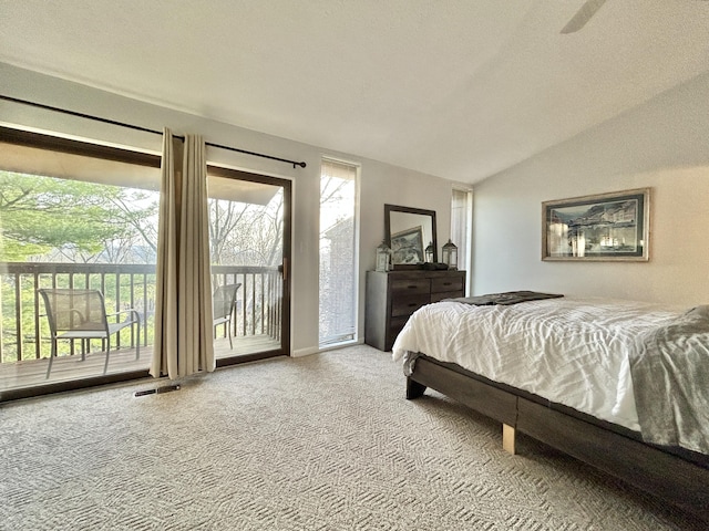 bedroom featuring carpet flooring, ceiling fan, access to exterior, and vaulted ceiling