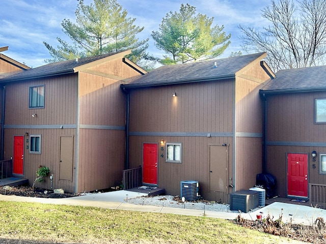 view of side of property featuring cooling unit