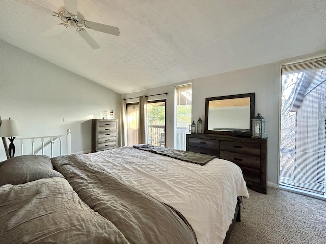 bedroom with access to exterior, ceiling fan, carpet floors, a textured ceiling, and lofted ceiling