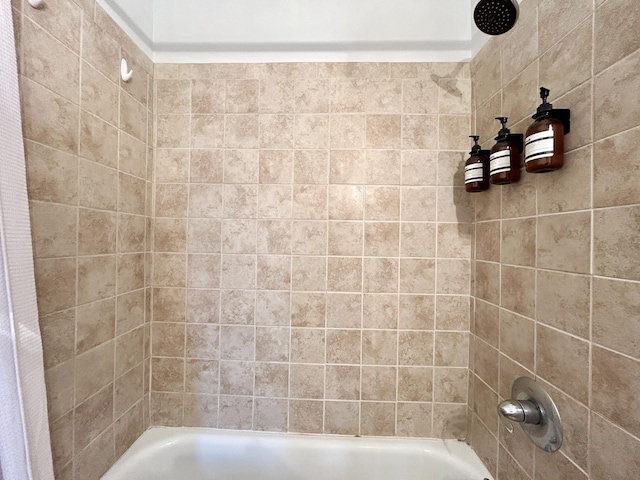 bathroom with shower / tub combo