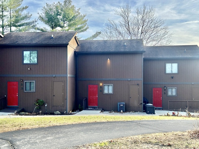 view of building exterior featuring central AC unit