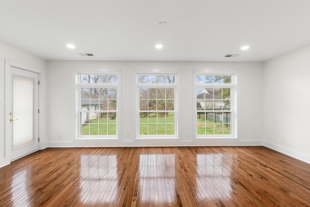 interior space with hardwood / wood-style floors