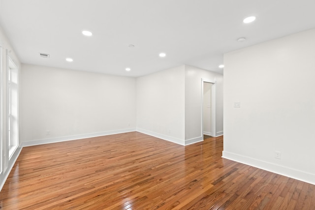 unfurnished room featuring light hardwood / wood-style floors