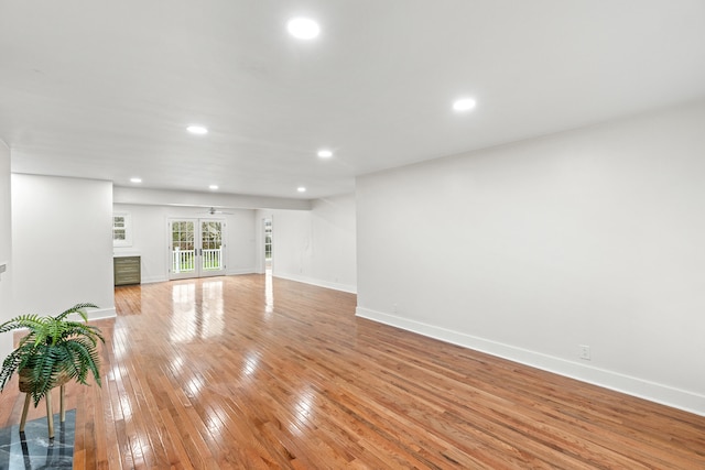 unfurnished living room featuring light wood-type flooring