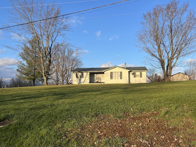 ranch-style house with a front yard