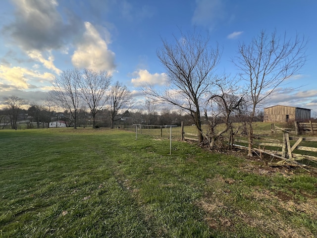 view of yard with a rural view