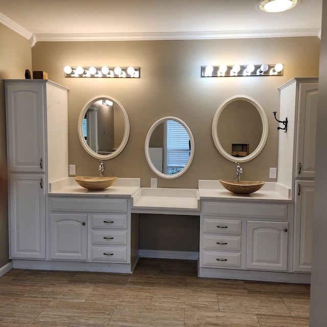 bathroom with vanity and crown molding