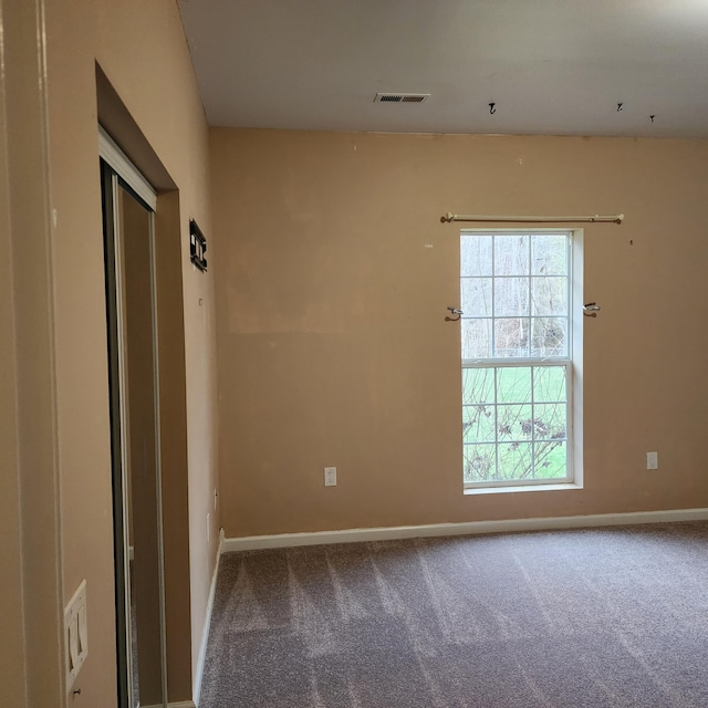 view of carpeted empty room