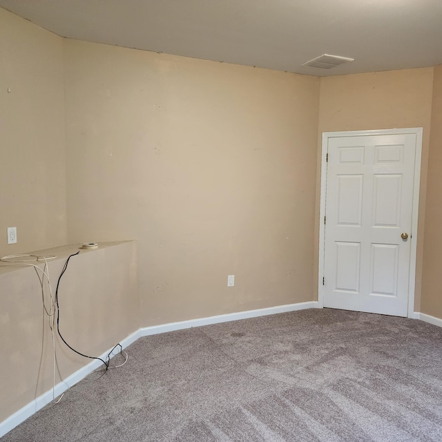 empty room with carpet flooring