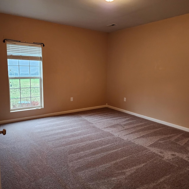 view of carpeted spare room