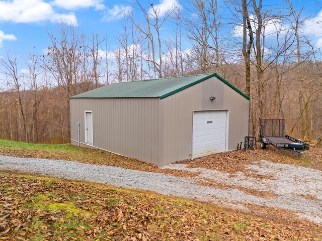 view of outdoor structure featuring a garage