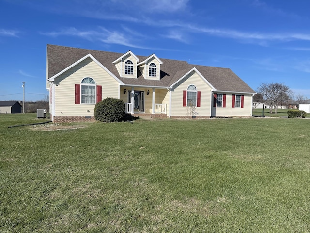 cape cod house featuring central air condition unit, a front lawn, and a porch