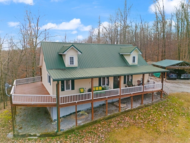 view of front of home with a carport