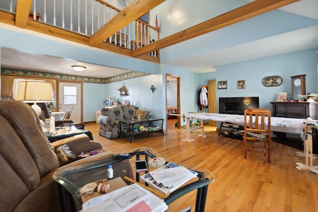 living room with light hardwood / wood-style flooring