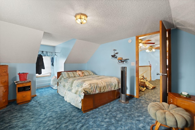 bedroom featuring a textured ceiling, lofted ceiling, and dark colored carpet