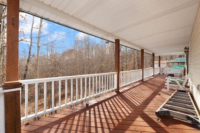 wooden terrace featuring a porch