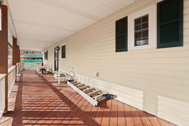 wooden deck featuring a porch