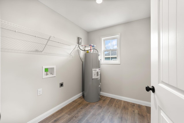 laundry area with washer hookup, electric water heater, hookup for an electric dryer, laundry area, and baseboards