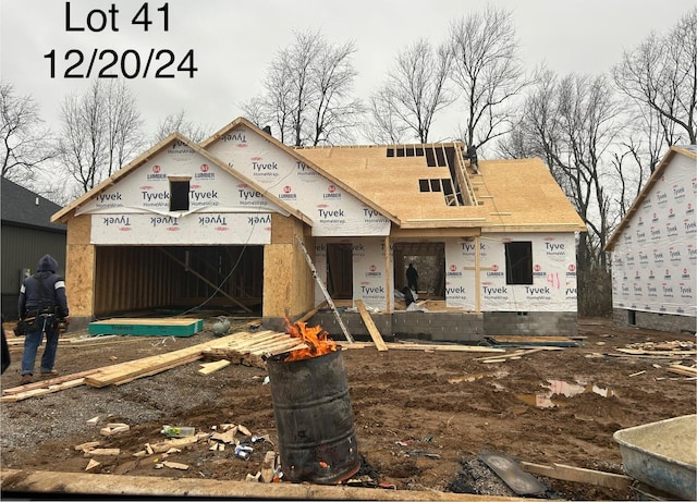 property in mid-construction featuring an attached garage