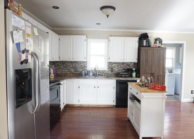 kitchen featuring white cabinetry, plenty of natural light, and black appliances