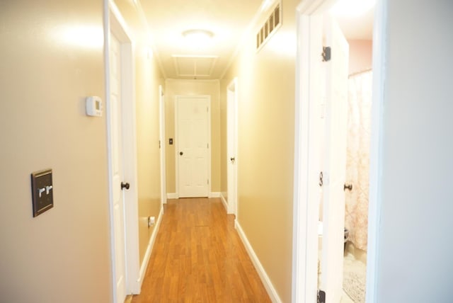 corridor featuring light wood-type flooring