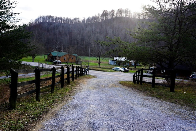 view of road with a mountain view and a rural view