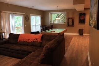 playroom with wood-type flooring and billiards