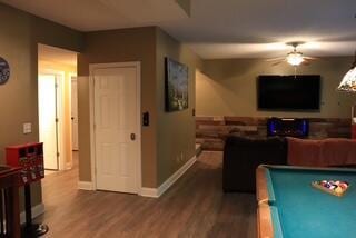 rec room with ceiling fan, dark wood-type flooring, and pool table