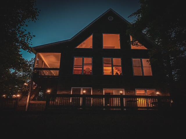 view of back house at night