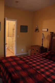 bedroom featuring light carpet