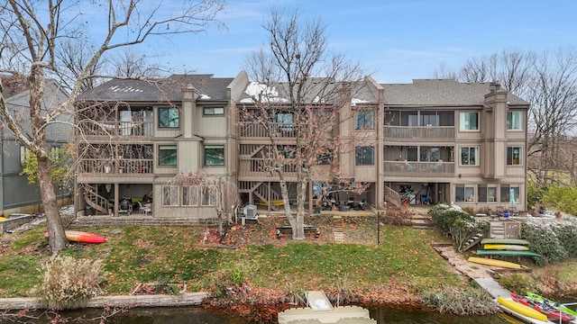 view of building exterior featuring a water view