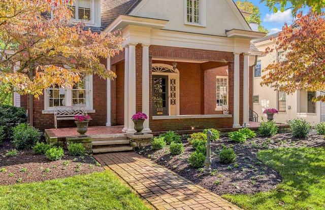 entrance to property with covered porch