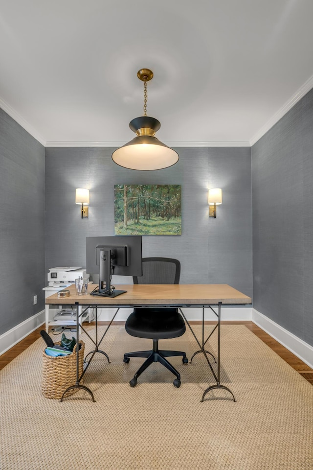 office area featuring light hardwood / wood-style flooring and crown molding