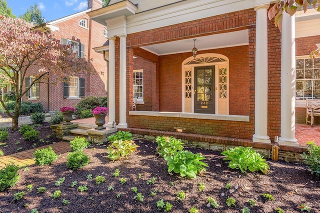 doorway to property with covered porch