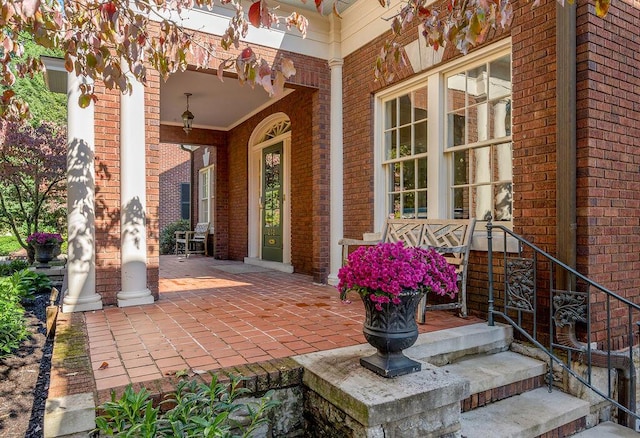 doorway to property with covered porch