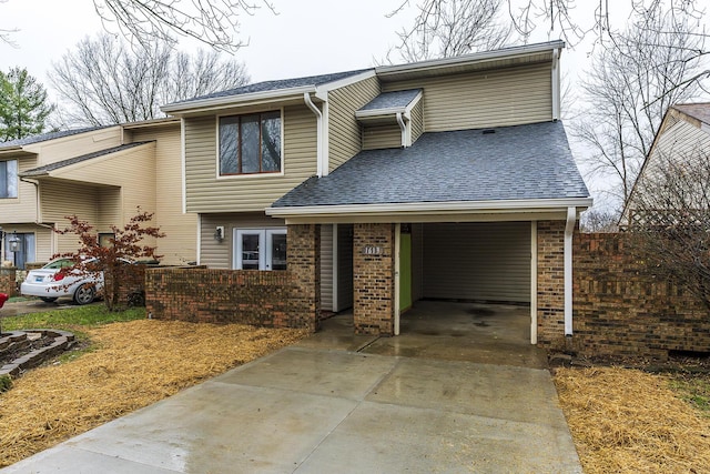 view of front of home with a carport