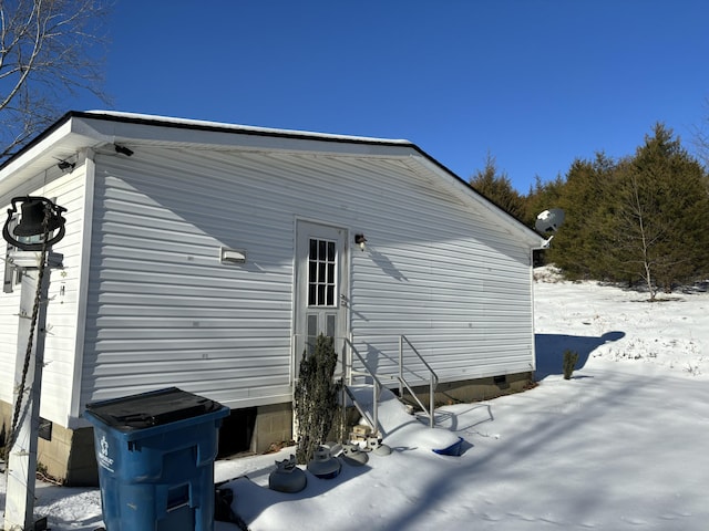 view of snow covered property