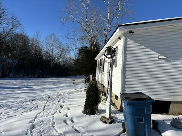 view of snow covered property