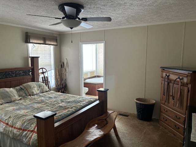 carpeted bedroom with a textured ceiling, ceiling fan, and crown molding