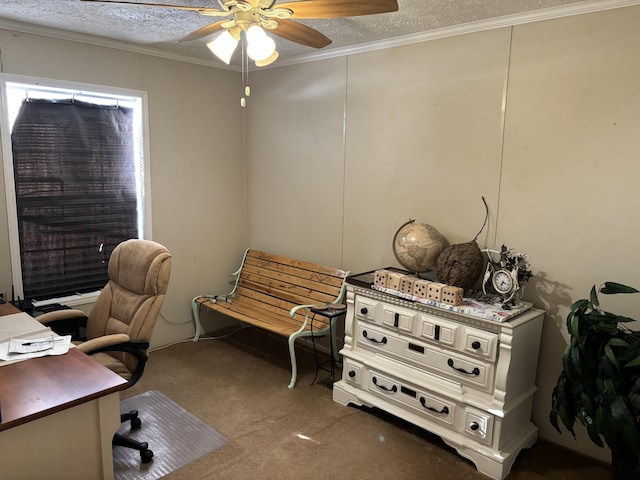 carpeted office space with a textured ceiling, ceiling fan, and ornamental molding