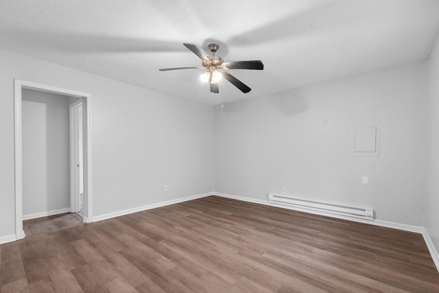 unfurnished room with a textured ceiling, hardwood / wood-style flooring, baseboard heating, and ceiling fan