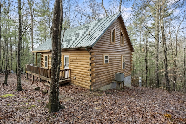 559 Eagle Ridge Rd, Campton, KY 41301 - view of home's exterior featuring log siding, a wooden deck, and a metal roof